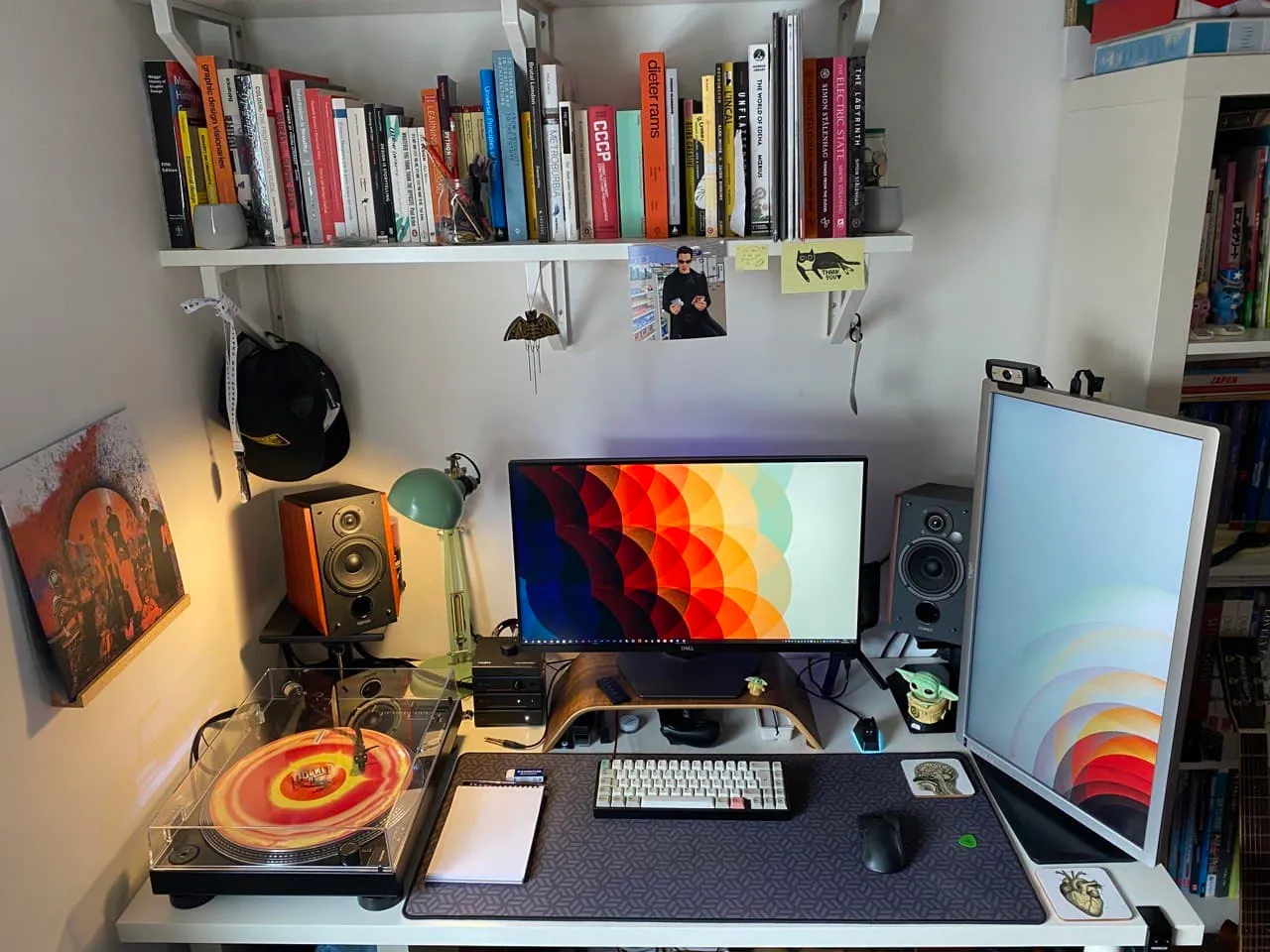 a photo of my desktop, with two monitors and a turntable